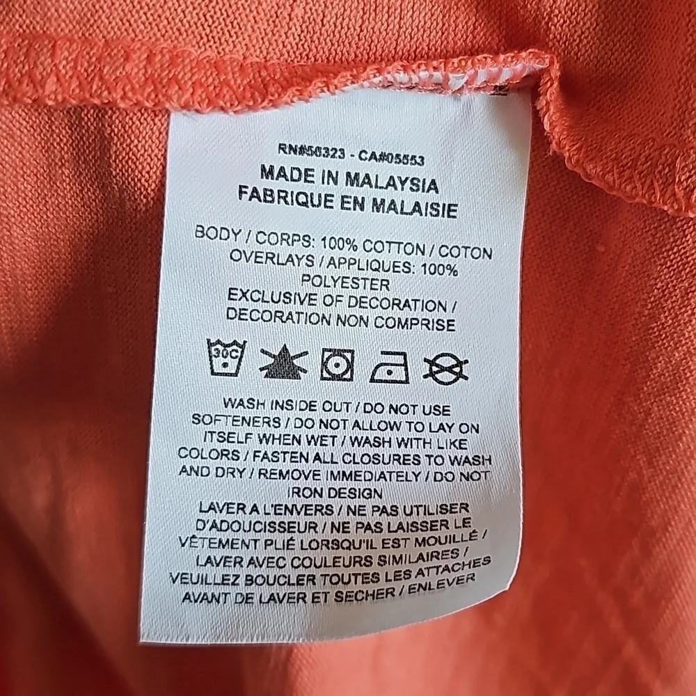 Nike Zip Pocket T-Shirt.